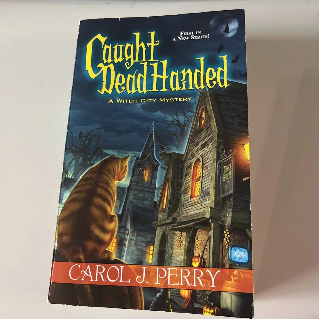 Caught Dead Handed by Carol J. Perry